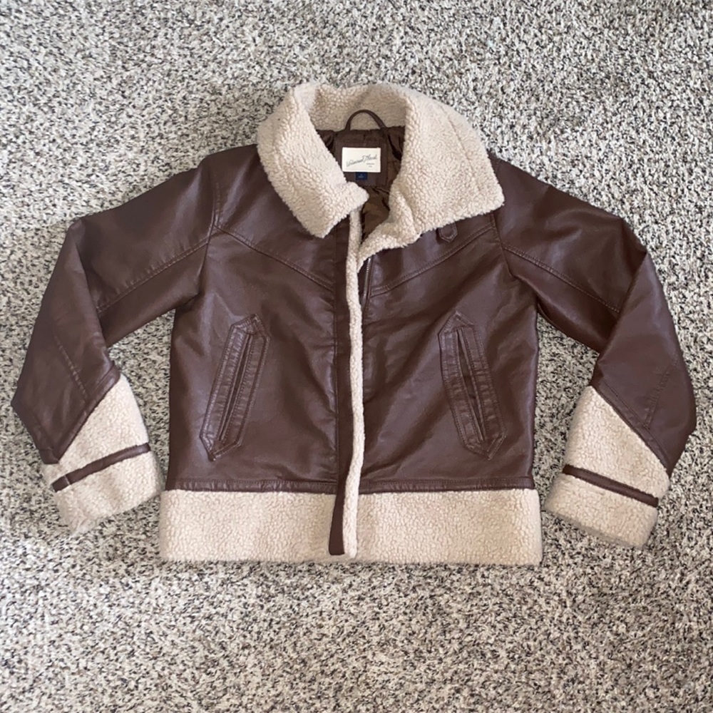 Faux leather waist length coat with shearling trimming
